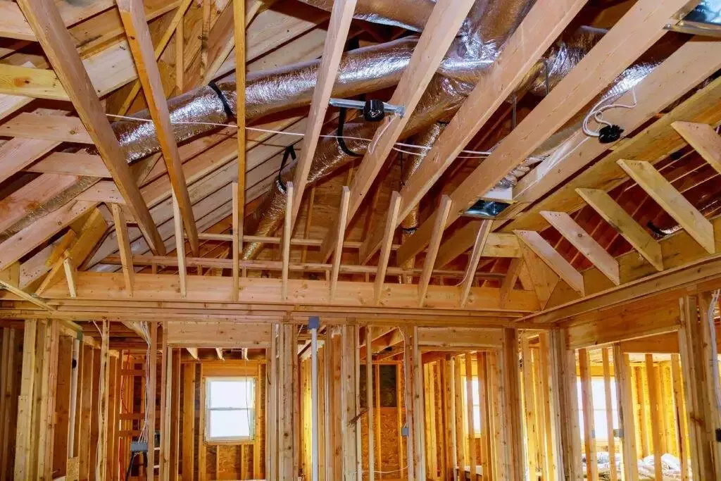 a wood frame house under construction