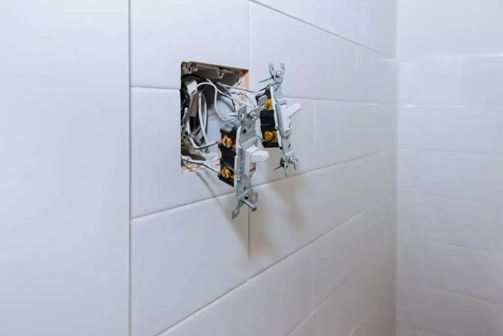 a white wall with wires and wires